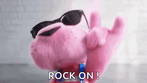 Pink Stuffed Animal Wearing Sunglasses Making Rock Sign GIF