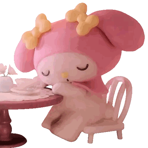 Pink Stuffed Animal with Yellow Bow
