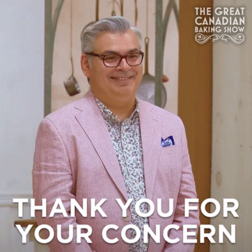 Pink Suit Man Smiling At Great Canadian Baking Show GIF