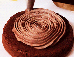 Piping Chocolate Filling On Cake GIF