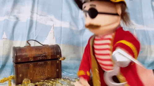 Pirate Puppet Next to Treasure Chest