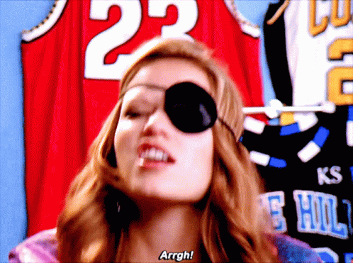 Pirate Woman Saying Arrgh in Front of Number 23 Jersey