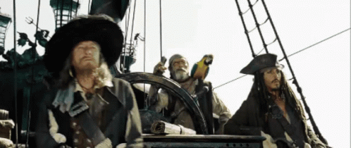 Pirates Sitting on Boat With Parrot on Steering Wheel