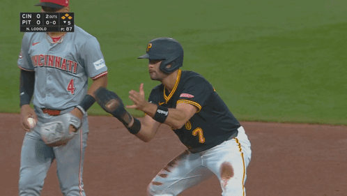 Pittsburgh Baseball Player Reaches for Ball