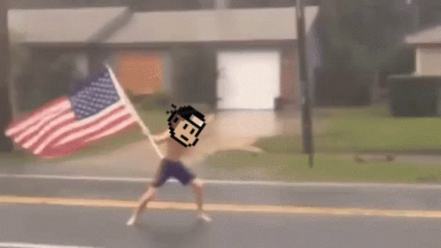 Pixel Art Man Holding American Flag GIF