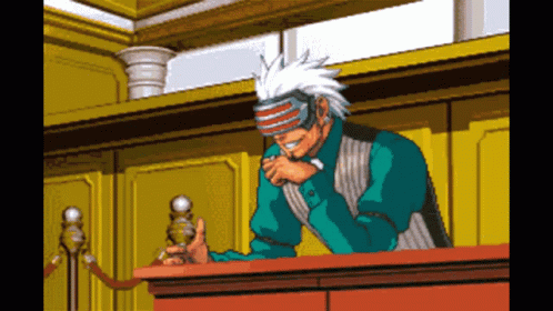 Pixel Art Man Wearing Mask Sitting at Table