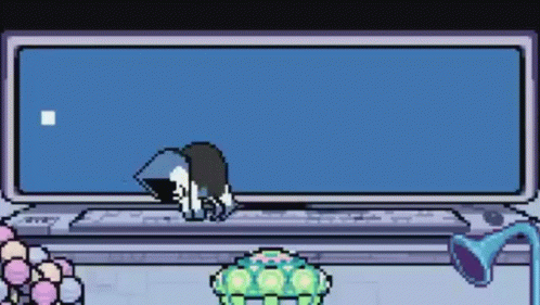 Pixel Art Person Sitting At Computer GIF