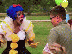 Pixelated Man and Woman Dressed as Clowns