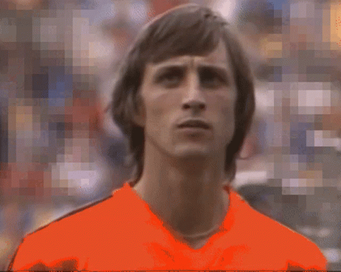 Pixelated Man In Orange Shirt GIF