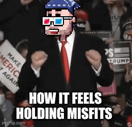 Pixelated Man In Suit Holding Misfits GIF