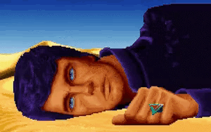 Pixelated Man with Blue Eyes Laying in Sand
