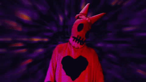 Pixelated Person in Red Horned Costume