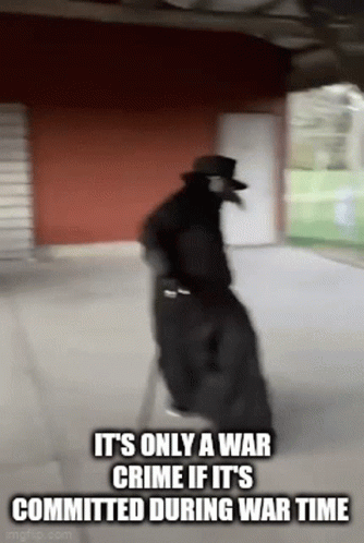 Plague Doctor Walking Down Sidewalk It's Only a War Crime