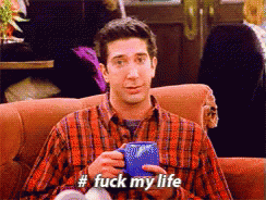 Plaid Shirt Man On Couch Holding Blue Mug Fuck My Life GIF