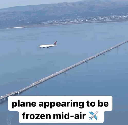 Plane Flying Over Bridge GIF