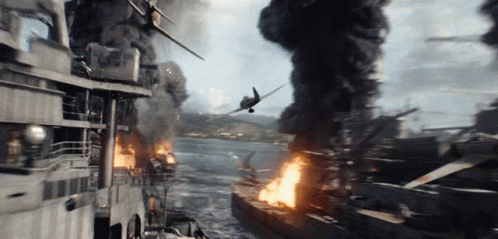 Plane Flying Over Burning Ship GIF
