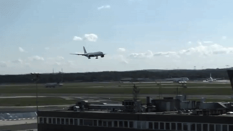 Plane Robot Runway Landing GIF
