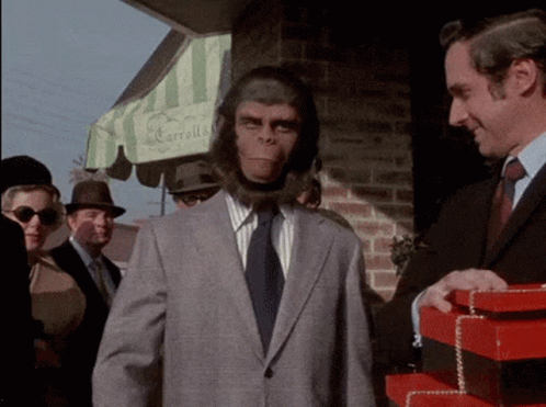 Planet Of The Apes Monkey On Suit GIF