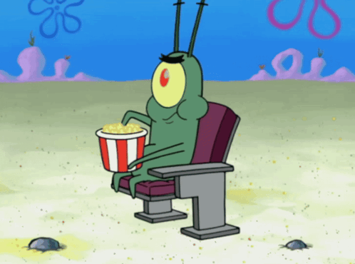 Plankton Sitting in Chair Holding Popcorn