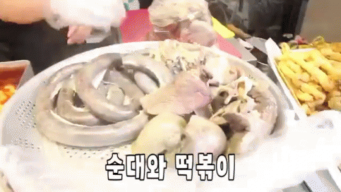 Plate Of Food With Foreign Writing GIF