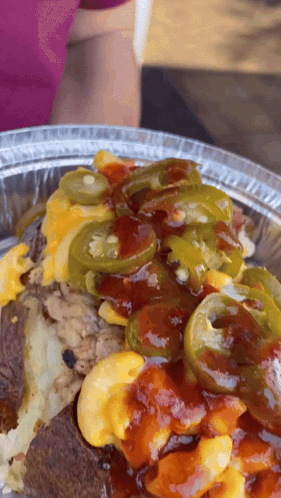 Plate of Food with Sauce and Jalapenos