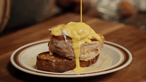 Plate of Food With Yellow Sauce