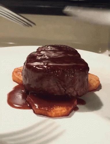 Plate With Steak And Potatoes In Chocolate Sauce GIF