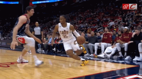 Player Number 35 For The Cavaliers Is Dribbling The Ball GIF
