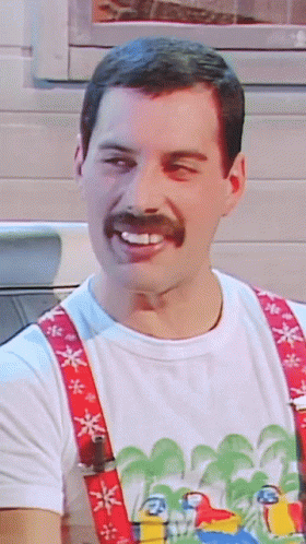 Playful Freddie Mercury Winks GIF