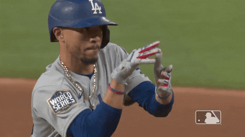 Playful Mookie Betts Ball Throwing Gesture GIF