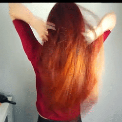 Playing On Beautiful Long Red Hair GIF