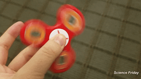Playing The Red Fidget Spinner GIF