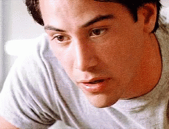 Point Break Keanu Reeves Looking At Nowhere GIF