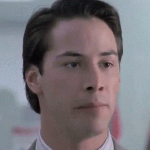 Point Break Keanu Reeves Chewing GIF