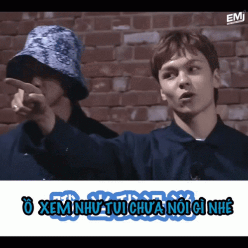 Pointing Man in Bucket Hat, Man Watching