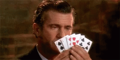 Poker Face Mel Gibson Playing Cards GIF