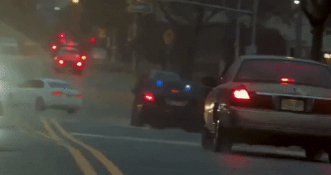Police Car Lights On The Streets GIF