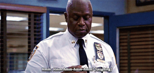 Police Man Saying Hmm Hmm Hmm Hmm Hmm Laughing GIF