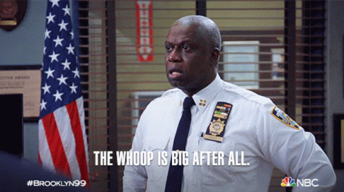 Police Officer In Front Of American Flag Says The Whoop Is Big After All GIF
