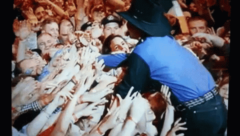 Police Officer in Front of Crowd