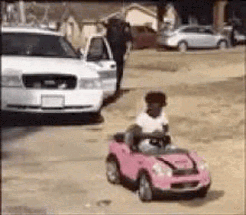 Police Officer Riding Tricycle Pressing Play