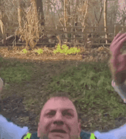 Police Officer Screaming in Yellow Vest