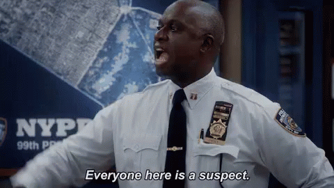 Police Officer Yelling in Front of Map