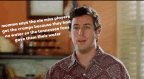 Polka Dot Shirt Man Talking Ole Miss Players