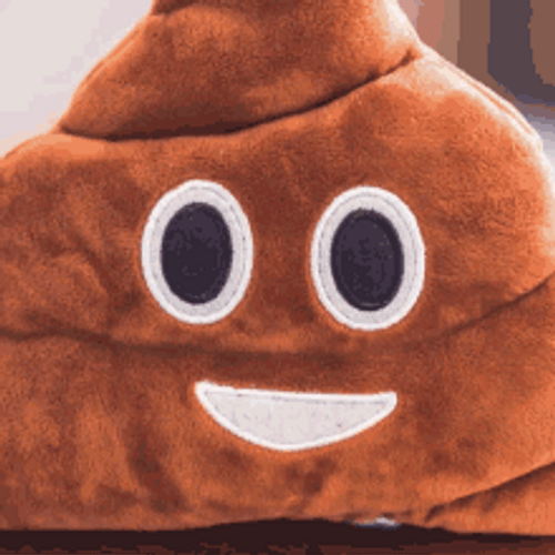 Poop Emoji Plush Toy Zooming In GIF