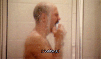 Poor Stressed Guy Taking Shower GIF