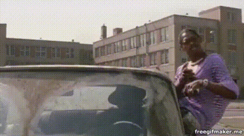 Pootie Tang Smiling Sitting Car Window GIF