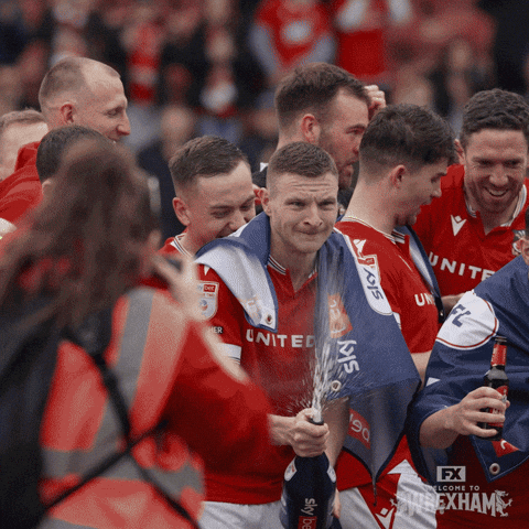 Pop Champagne Football Players GIF