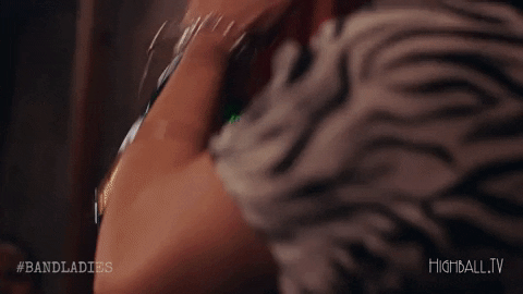 Pop Champagne Lady Shaking Bottle GIF