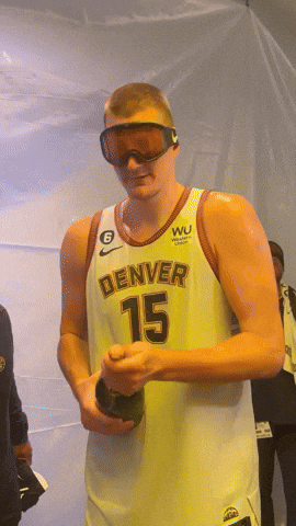Pop Champagne Nikola Jokic Denver Nuggets GIF